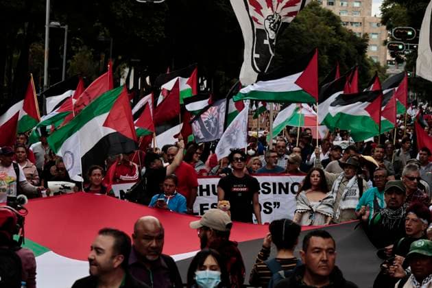 October 7, 2025, Mexico, Cdmx, Mexico: Protesters and pro-Palestinian groups march from the Juarez Chamber to the American Embassy in Mexico City, continuing to exert pressure by demanding a ceasefire in the Gaza Strip and that the Mexican government sever relations with the State of Israel. Today marks two years since the genocide caused by the continuous attacks on the Palestinian State, which has been recognized by several countries in the United Nations (UN). Despite this, the government of Benjamin Netanyahu continues with the intention of occupying the country, ignoring international pressure. All this continues to occur while the Israeli government released the Mexican representatives who accompanied the SUMUD Global Flotilla to deli - ZUMAp204 20251007_zip_p204_011 Copyright: xJosuexPerezx