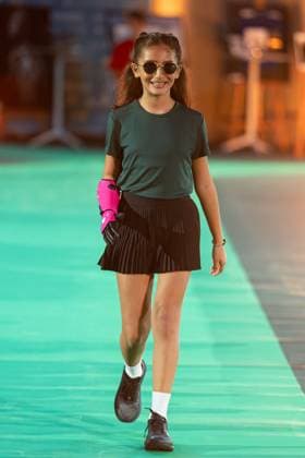 Runway For The Association Debout En Bouts At Roland-Garros Talia Mawazini walks the runway for the association Debout En Bouts. 30 amputees wearing prosthetics parade on the Philippe-Chatrier court at Roland-Garros stadium on October 08, 2025 in Paris, France. Photo by Nasser Berzane ABACAPRESS.COM Paris France  Copyright: xBerzanexNasser ABACAx