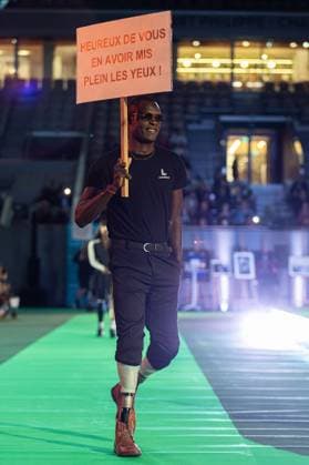 Runway For The Association Debout En Bouts At Roland-Garros Issa Nlareb walks the runway for the association Debout En Bouts. 30 amputees wearing prosthetics parade on the Philippe-Chatrier court at Roland-Garros stadium on October 08, 2025 in Paris, France. Photo by Nasser Berzane ABACAPRESS.COM Paris France  Copyright: xBerzanexNasser ABACAx