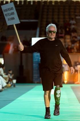 Runway For The Association Debout En Bouts At Roland-Garros Philippe Louzeau walks the runway for the association Debout En Bouts. 30 amputees wearing prosthetics parade on the Philippe-Chatrier court at Roland-Garros stadium on October 08, 2025 in Paris, France. Photo by Nasser Berzane ABACAPRESS.COM Paris France  Copyright: xBerzanexNasser ABACAx