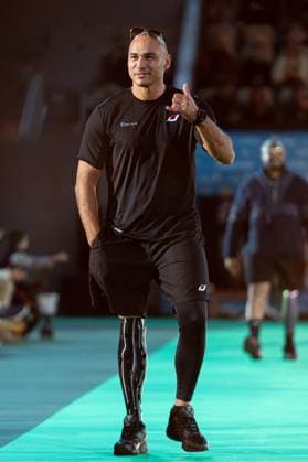 Runway For The Association Debout En Bouts At Roland-Garros Abel Aber walks the runway for the association Debout En Bouts. 30 amputees wearing prosthetics parade on the Philippe-Chatrier court at Roland-Garros stadium on October 08, 2025 in Paris, France. Photo by Nasser Berzane ABACAPRESS.COM Paris France  Copyright: xBerzanexNasser ABACAx
