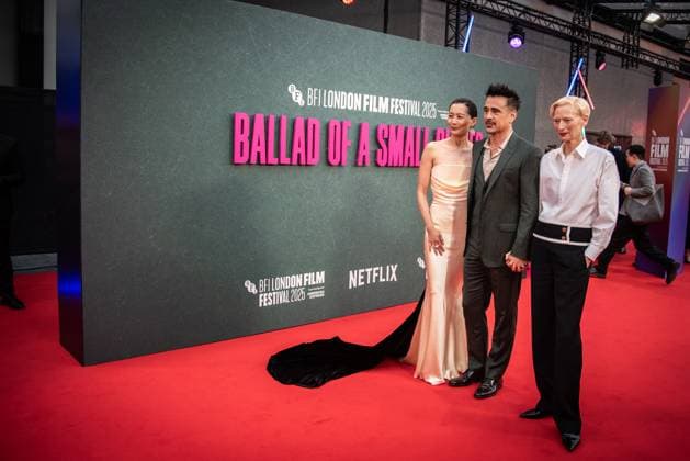 October 9, 2025, London, United Kingdom: Fala Chen, Colin Farrell and Tilda Swinton attend the Ballad of a Small Player Headline Gala during the 69th BFI London Film Festival at The Royal Festival Hall. London United Kingdom - ZUMAs197 20251009_aaa_s197_155 Copyright: xLoredanaxSangiulianox