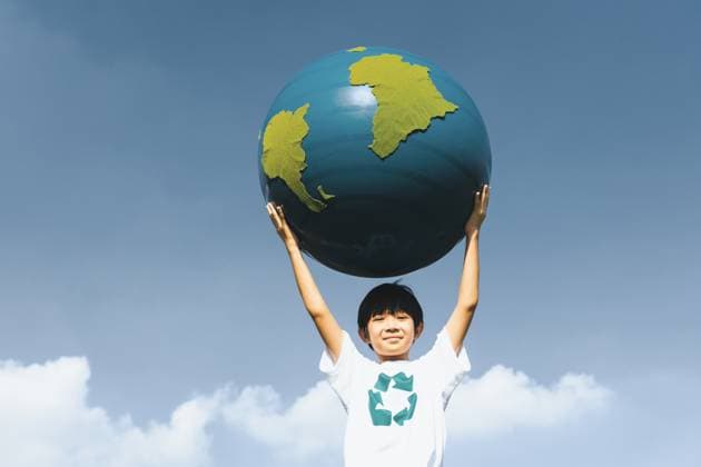 Young asian boy holding planet Earth globe at natural park background. Gyre Young asian boy holding big planet Earth globe at sky and cloudscape background as Earth day to save this planet with ESG principle and environment friendly energy for brighter future. Gyre, model released, , 59829422.jpg RECORD DATE NOT STATED