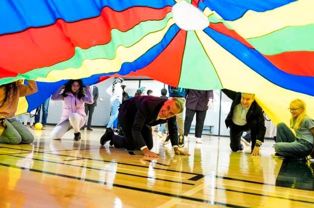 October 10, 2025, Ottawa, On, CAN: Prime Minister Mark Carney and Minister of Finance and National Revenue Francois-Philippe Champagne join children in a parachute game at a community centre, before participating in an announcement in Ottawa, on Friday, Oct. 10, 2025. Ottawa CAN  - ZUMAc35_ 20251010_zaf_c35_005 Copyright: xJustinxTangx