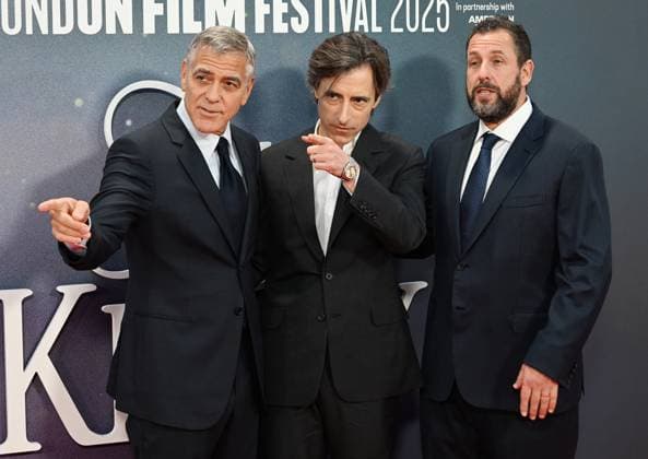 American director Noah Baumbach, actors Adam Sandler and George Clooney attend the premiere of Jay Kelly at the 69th BFI London Film Festival in London, England on Friday, October 10, 2025.  LON20251010132 RUNExHELLESTAD