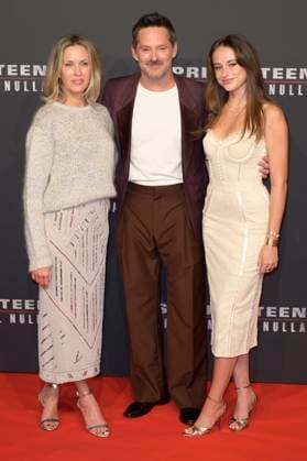 Springsteen Liberami dal nulla red carpet in Rome, Italy - 10 Oct 2025 Jocelyne Cooper (l), Scott Cooper (c) and Ava Cooper (r) attend the Springsteen Liberami dal Nulla movie red carpet at The Space Cinema Moderno. Rome Italy Copyright: xMarioxCartellix xSOPAxImagesx _DSC4521