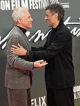 American actor Oscar Isaacs and Austrian actor Christoph Waltz attend the premiere of Frankenstein at the 69th BFI London Film Festival in London, England on Monday October 13, 2025.  LON20251013104 RUNExHELLESTAD