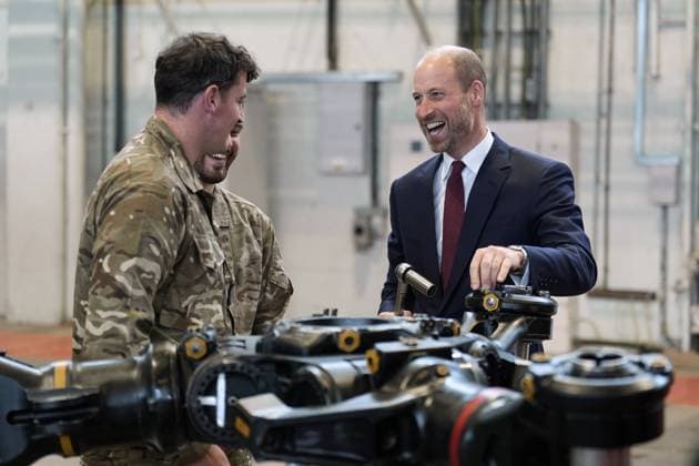 Royal visit to RAF Benson The Prince of Wales (right) helps work on a main rotor head of a Chinook helicopter as he meets helicopter technicians from No. 28 (AC) Sqn during a visit to RAF Benson in Wallingford, Oxfordshire. Picture date: Wednesday October 15, 2025., Credit:Andrew Matthews Avalon UK, Wallingford  Copyright: xAndrewxMatthewsx xAvalonx 1045749204