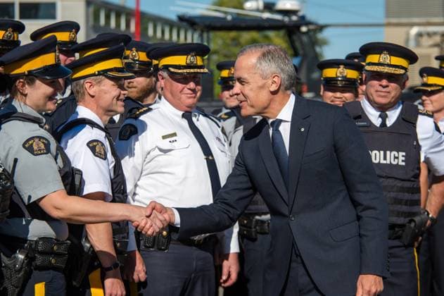 October 16, 2025, Etobicoke, On, Canada: Prime Minister Mark Carney visits an RCMP detachment to make an announcement in Etobicoke, Ont., on Thursday, Oct. 16, 2025. Etobicoke Canada  - ZUMAc35_ 20251016_zaf_c35_032 Copyright: xLauraxProctorx