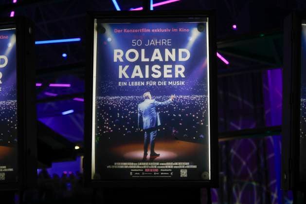 World premiere of the Roland Kaiser concert film 50 years of Roland Kaiser A life for music in Münster Münster, 16 10 2025 Roland Kaiser poster at the Cineplex Münster at the world premiere of the Roland Kaiser concert film in Münster NRW Copyright: xMatthiasxGränzdörferx
