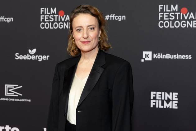 Actress Maren EGGERT mi , laureate International Actors Award 2025, portrait, portrait, friendly, half figure, laughing, red carpet, at the Film Festival Cologne, at the Filmpalast Koeln, on 16 10 2025