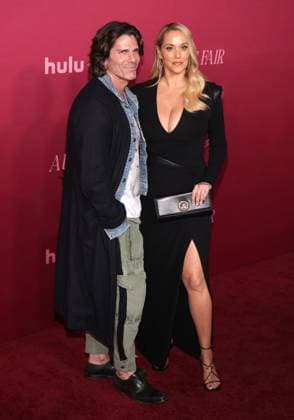 LOS ANGELES, CA - OCTOBER 16: Greg Lauren and Elizabeth Berkley at the world premiere of Hulu s ˜All s Fair™ at the DGA theatre in Los Angeles, California on October 16, 2025. Copyright: xCrashx xMediaPunchx