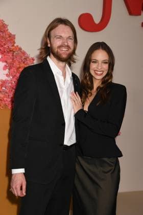 LOS ANGELES, CA - OCTOBER 16: Finneas O Connell and Claudia Sulewski at the Netflix Premiere of Nobody Wants This at The Egyptian Theatre on October 16, 2025 in Los Angeles, California. Copyright: xJeffreyxMayerx