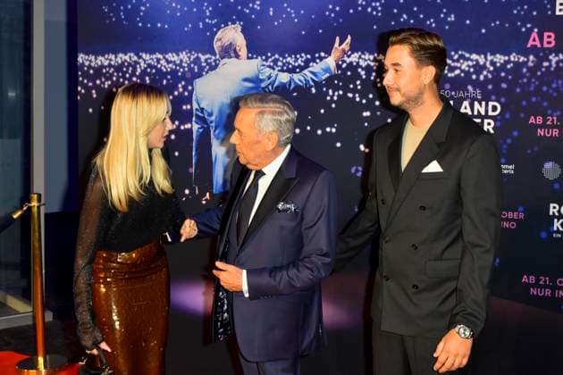 abb Roland Kaiser with daughter Annalena and son Jan der Schlagersaenger on the red carpet at the world premiere of the movie 50 Jahre Roland Kaiser Ein Leben fuer die Musik at the cinema Cineplex on 16 10,2025 in Muenster NRW Germany