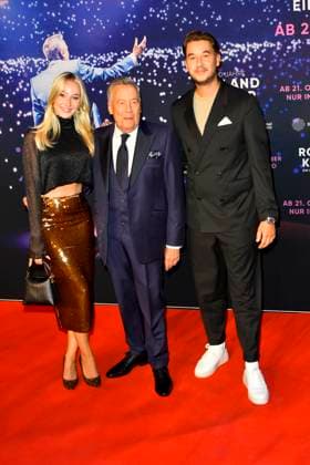 abb Roland Kaiser with daughter Annalena and son Jan der Schlagersaenger on the red carpet at the world premiere of the movie 50 Jahre Roland Kaiser Ein Leben fuer die Musik at the cinema Cineplex on 16 10,2025 in Muenster NRW Germany