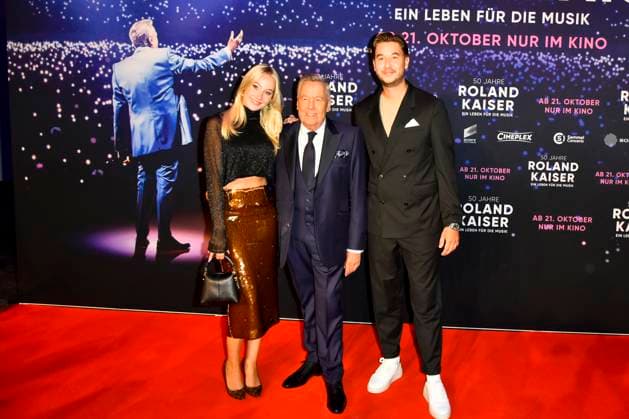abb Roland Kaiser with daughter Annalena and son Jan der Schlagersaenger on the red carpet at the world premiere of the movie 50 Jahre Roland Kaiser Ein Leben fuer die Musik at the cinema Cineplex on 16 10,2025 in Muenster NRW Germany