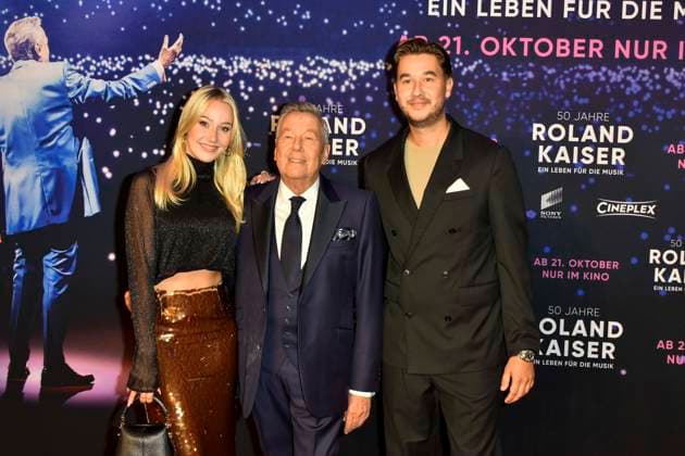 abb Roland Kaiser with daughter Annalena and son Jan der Schlagersaenger on the red carpet at the world premiere of the movie 50 Jahre Roland Kaiser Ein Leben fuer die Musik at the cinema Cineplex on 16 10,2025 in Muenster NRW Germany