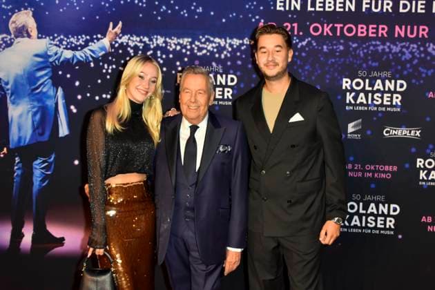 abb Roland Kaiser with daughter Annalena and son Jan der Schlagersaenger on the red carpet at the world premiere of the movie 50 Jahre Roland Kaiser Ein Leben fuer die Musik at the cinema Cineplex on 16 10,2025 in Muenster NRW Germany
