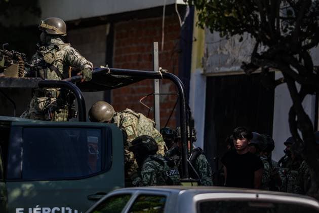 Two police officers were killed while on duty in Mexico CULIACAN, MEXICO - OCTOBER 17: Four young men were arrested for their alleged involvement in the murder of two Culiacan Municipal Traffic Police officers on October 17, 2025 in Culiacan, Mexico. The suspected gunmen were traveling in a white Toyota Corolla when they were intercepted by members of the Mexican Army. Authorities also seized long guns, tactical gear, and ammunition of various calibers. The arrest took place just minutes after the crime in which the municipal officers from Culiacan, were killed. Jesus Verdugo Anadolu Culiacan Mexico. Editorial use only. Please get in touch for any other usage.  Copyright: x2025xAnadoluxJesusxVerdugox