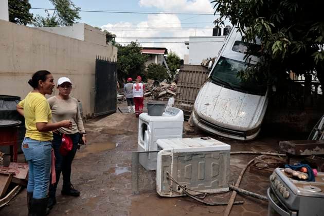October 17, 2025, Veracruz, Poza Rica, Mexico: One week after Tropical Storm RAYMOND caused severe damage and flooding in Poza Rica, Veracruz, a caravan of Mexican Red Cross personnel delivered humanitarian aid, provided health services, and provided free internet access to contact or search for missing relatives in the most affected areas of this municipality. The oÂlamo region was the hardest hit, where water swept away vehicles and furniture, and even completely covered some homes due to overflowing rivers. This also damaged communication and electricity services. The cleanup work has been carried out largely by residents themselves, as they are in areas that are difficult to access due to the enormous amount of mud covering their stre - ZUMAp204 20251017_zip_p204_037 Copyright: xJosuexPerezx