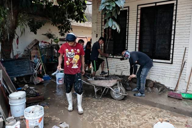 October 17, 2025, Veracruz, Poza Rica, Mexico: One week after Tropical Storm RAYMOND caused severe damage and flooding in Poza Rica, Veracruz, a caravan of Mexican Red Cross personnel delivered humanitarian aid, provided health services, and provided free internet access to contact or search for missing relatives in the most affected areas of this municipality. The oÂlamo region was the hardest hit, where water swept away vehicles and furniture, and even completely covered some homes due to overflowing rivers. This also damaged communication and electricity services. The cleanup work has been carried out largely by residents themselves, as they are in areas that are difficult to access due to the enormous amount of mud covering their stre - ZUMAp204 20251017_zip_p204_038 Copyright: xJosuexPerezx