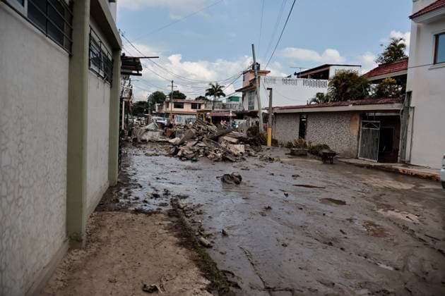 October 17, 2025, Veracruz, Poza Rica, Mexico: One week after Tropical Storm RAYMOND caused severe damage and flooding in Poza Rica, Veracruz, a caravan of Mexican Red Cross personnel delivered humanitarian aid, provided health services, and provided free internet access to contact or search for missing relatives in the most affected areas of this municipality. The oÂlamo region was the hardest hit, where water swept away vehicles and furniture, and even completely covered some homes due to overflowing rivers. This also damaged communication and electricity services. The cleanup work has been carried out largely by residents themselves, as they are in areas that are difficult to access due to the enormous amount of mud covering their stre - ZUMAp204 20251017_zip_p204_042 Copyright: xJosuexPerezx