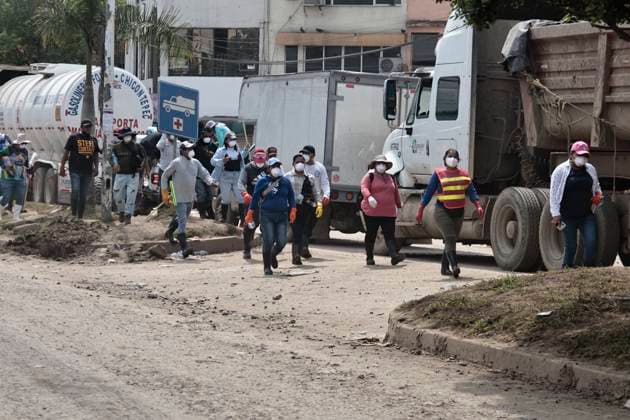October 17, 2025, Veracruz, Poza Rica, Mexico: One week after Tropical Storm RAYMOND caused severe damage and flooding in Poza Rica, Veracruz, a caravan of Mexican Red Cross personnel delivered humanitarian aid, provided health services, and provided free internet access to contact or search for missing relatives in the most affected areas of this municipality. The oÂlamo region was the hardest hit, where water swept away vehicles and furniture, and even completely covered some homes due to overflowing rivers. This also damaged communication and electricity services. The cleanup work has been carried out largely by residents themselves, as they are in areas that are difficult to access due to the enormous amount of mud covering their stre - ZUMAp204 20251017_zip_p204_053 Copyright: xJosuexPerezx