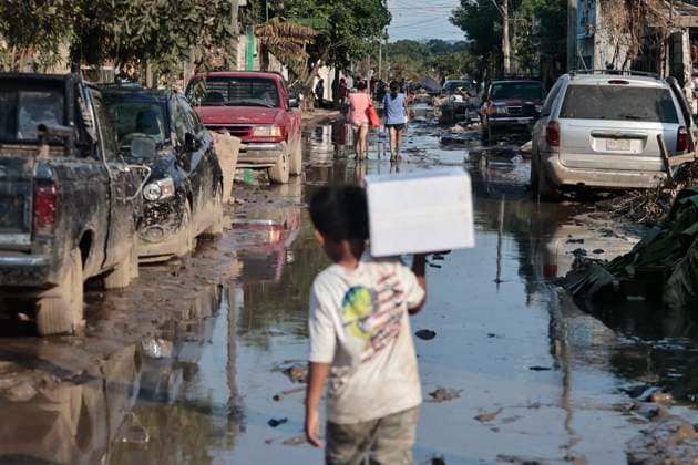 October 17, 2025, Veracruz, Poza Rica, Mexico: One week after Tropical Storm RAYMOND caused severe damage and flooding in Poza Rica, Veracruz, a caravan of Mexican Red Cross personnel delivered humanitarian aid, provided health services, and provided free internet access to contact or search for missing relatives in the most affected areas of this municipality. The oÂlamo region was the hardest hit, where water swept away vehicles and furniture, and even completely covered some homes due to overflowing rivers. This also damaged communication and electricity services. The cleanup work has been carried out largely by residents themselves, as they are in areas that are difficult to access due to the enormous amount of mud covering their stre - ZUMAp204 20251017_zip_p204_095 Copyright: xJosuexPerezx