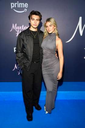 abb Maxton Hall Noah Miguel Oechsle Rodriguez and Lara Sprengler as guests on the blue carpet at the premiere of the Amazon Prime TV series Maxton Hall The World Between Us Season 2 at Tempodrom on 17 10 2025 in Berelin Berlin Germany