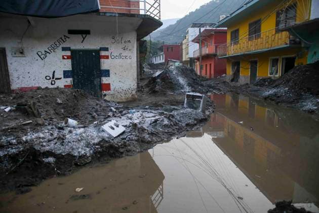 October 20, 2025, Mexico City, Mexico City, Mexico: Damage caused by Hurricane Priscila in the municipality of Huehuetla in the OtomoÂ­ Tepehua mountain range, one of the most affected municipalities in the state of Hidalgo, due to its proximity to the Pantepec River, houses completely filled with mud and cars buried. Mexico City Mexico - ZUMAs310 20251020_zip_s310_003 Copyright: xLuisxExSalgadox