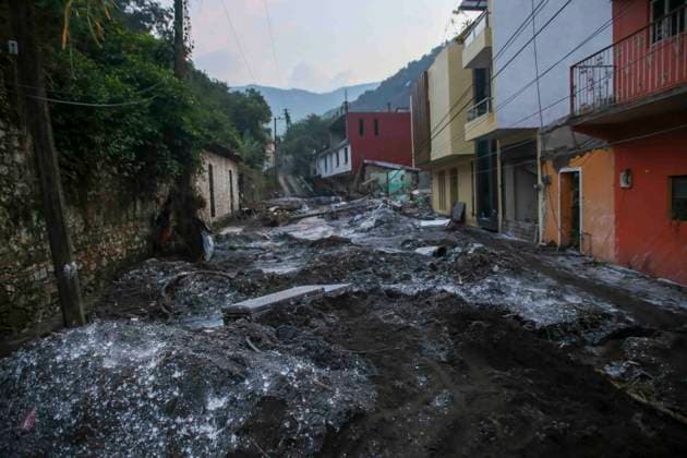 October 20, 2025, Mexico City, Mexico City, Mexico: Damage caused by Hurricane Priscila in the municipality of Huehuetla in the OtomoÂ­ Tepehua mountain range, one of the most affected municipalities in the state of Hidalgo, due to its proximity to the Pantepec River, houses completely filled with mud and cars buried. Mexico City Mexico - ZUMAs310 20251020_zip_s310_011 Copyright: xLuisxExSalgadox
