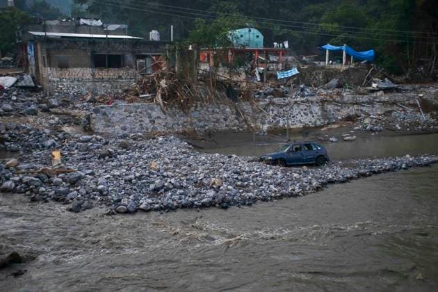 October 20, 2025, Mexico City, Mexico City, Mexico: Damage caused by Hurricane Priscila in the municipality of Huehuetla in the OtomoÂ­ Tepehua mountain range, one of the most affected municipalities in the state of Hidalgo, due to its proximity to the Pantepec River, houses completely filled with mud and cars buried. Mexico City Mexico - ZUMAs310 20251020_zip_s310_013 Copyright: xLuisxExSalgadox