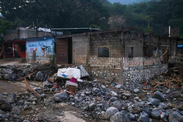 October 20, 2025, Mexico City, Mexico City, Mexico: Damage caused by Hurricane Priscila in the municipality of Huehuetla in the OtomoÂ­ Tepehua mountain range, one of the most affected municipalities in the state of Hidalgo, due to its proximity to the Pantepec River, houses completely filled with mud and cars buried. Mexico City Mexico - ZUMAs310 20251020_zip_s310_015 Copyright: xLuisxExSalgadox