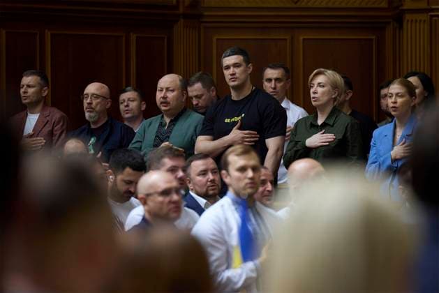 Ukrainian President Volodymyr Zelenskyy Celebrates Ukrainian Statehood Day at the Verkhovna Rada July 28, 2022, Kyiv, Ukraine: Members of the Ukrainian cabinet stand for the national anthem at the Verkhovna Rada parliament, July 28, 2022 in Kyiv, Ukraine. Copyright: xUkrainianxPresidentialxOfficex