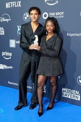 Lamin Leroy Gibba and Melodie Simina at the presentation of the Blue Panther TV Streaming Award 2025 at BMW Welt Munich, 22 10 2025 Foto:xN.xKolinzx xFuturexImagex panther_5533