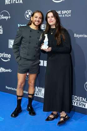 Ricardo Simonetti and Tara Louise Wittwer at the presentation of the Blue Panther TV Streaming Award 2025 at BMW Welt Munich, 22 10 2025 Foto:xN.xKolinzx xFuturexImagex panther_5542