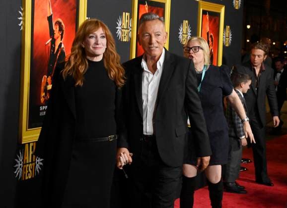 Bruce Springsteen (R) and his wife Patti Scialfa attend the AFI opening night premiere of the biographical drama Springsteen: Deliver Me From Nowhere at the TCL Chinese Theatre in the Hollywood section of Los Angeles on Wednesday, October 22, 2025. Storyline: Bruce Springsteen s journey crafting his 1982 album Nebraska, which emerged as he recorded Born in the USA with the E Street Band. Based on Warren Zanes book.  LAP2025102246 JIMxRUYMEN