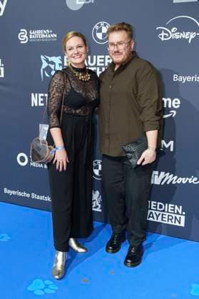Florian Hüttner with companion at the presentation of the Blue Panther TV Streaming Award 2025 at BMW Welt Munich, 22 10 2025 Foto:xN.xKolinzx xFuturexImagex panther_5082