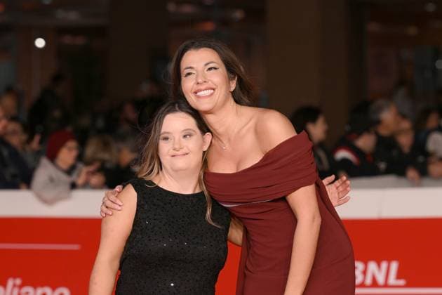 20th Rome Film Festival, red carpet for the film Roberto Rossellini, More Than a Lifetime Rome Film Fest, 20th edition, red carpet for the film Roberto Rossellini, More Than a Life. In the photo Claudia Conte e un ospite. . Rome, Italy 23 October 2025, Credit:Maria Laura Antonelli Avalon Italy, Rome  Copyright: xMariaxLauraxAntonellix xAvalonx 1047683545