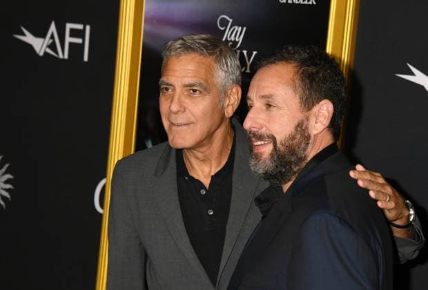 LOS ANGELES, CA - OCTOBER 23: George Clooney and Adam Sandler at the AFI Fest 2025 Premiere of Jay Kelly at TCL Chinese Theatre on October 23, 2025 in Los Angeles, California. Copyright: xJeffreyxMayerx