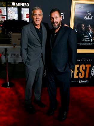 October 23, 2025, Hollywood, California, USA: American actor, filmmaker, activist, and humanitarian GEORGE CLOONEY and American actor and comedian ADAM SANDLER attend AFI FEST Presented By Red Carpet Premiere of Jay Kelly Hollywood USA - ZUMAb173 20251023_aap_b173_005 Copyright: xBillyxBennightx