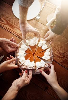 Slice, hands and pumpkin pie for event, snack and Thanksgiving with celebration, people and dessert. Closeup, catering and group with food, wooden table or family with social gathering and sweet meal Slice, hands and pumpkin pie for event, snack and Thanksgiving with celebration, people and dessert. Closeup, catering and group with food, wooden table or family with social gathering and sweet meal., model released, , 60480630.jpg RECORD DATE NOT STATED