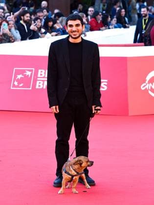 Rome: Rome Cinema Fest 2025, evening 11 - Red Carpet for the film Tienimi Presente. Pictured: Alberto Palmiero with his dog Jonny. Rome  - ZUMAp169 20251024_zea_p169_682 Copyright: xMarcoxProvvisionatox