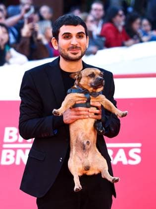 Rome Cinema Fest 2025, evening 11 - Red Carpet for the film Tienimi Presente. Pictured: Alberto Palmiero with his dog Jonny.  Copyright: xMarcoxProvvisionatox xipa-agency.netx xDxAvanzo Provvisionatox IPA_Agency_IPA67016929