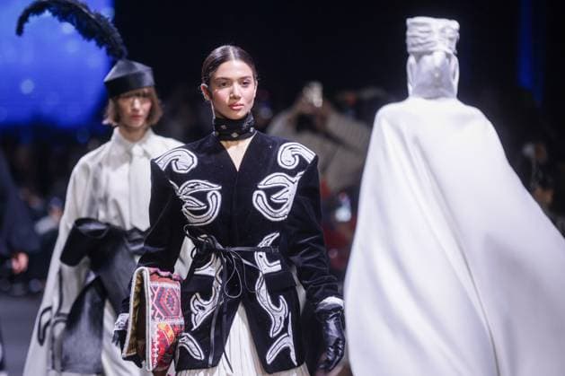 ARMENIA, YEREVAN - OCTOBER 24, 2025: A woman models creations during a runway show for ZhSaken x Akmaral, a Kazakh fashion brand collaboration, as part of Yerevan Fashion Week 2025 at the Meridian Expo and Event Centre. Alexander Patrin TASS  85115979