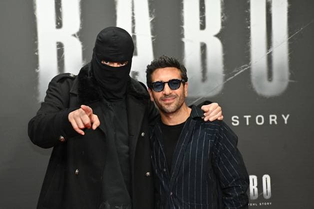 Rapper Haftbefehl Aykut Anhan and Elyas M Barek at the Babo The Haftbefehl Story Netflix documentary premiere on 24 10 2025 at the Astor Film Lounge in Berlin Babo Netflix Premiere in Berlin