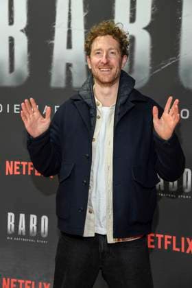 abb Haftbefehl Louis Klamroth TV presenter as a guest on the red carpet of the special screening event of the Netflix documentary highlight Babo The Haftbefehl Story at the Astor Film Lounge on 24 10 2025in Berlin Berlin Germany