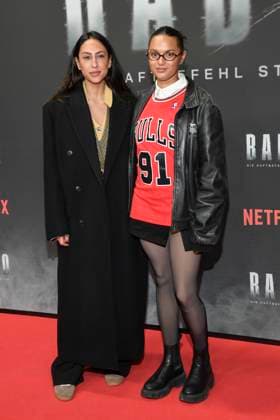 abb Haftbefehl Claudia Urbschat Mingues and Taneshia Abt as guests on the red carpet of the special screening event of the Netflix documentary highlight Babo The Haftbefehl Story at the Astor Film Lounge on 24 10 2025in Berlin Berlin Germany