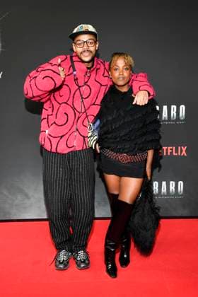 abb Haftbefehl Yannik Niang and Tsellot Melesse as guests on the red carpet of the special screening event of the Netflix documentary highlight Babo The Haftbefehl Story at the Astor Film Lounge on 24 10 2025in Berlin Berlin Germany
