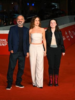 Rome: Rome Cinema Fest 2025, evening 11 - Red Carpet for the film Tutta la Vita. Pictured are Stefano Bollani, Valentina Cenni, and Frida Bollani Magon. Rome  - ZUMAp169 20251025_zea_p169_662 Copyright: xMaurizioxD Avanzox